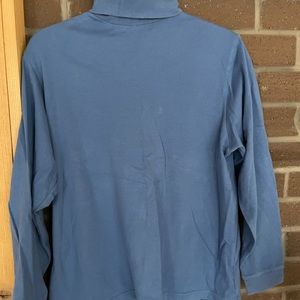 Long sleeved blue turtle neck in a L size by Eddie Bauer